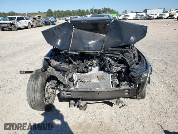 2025 Cadillac CT5 Sport with VIN 1G6DP5RK9S0112073, listed as a Copart auction lot 49506065 with 7,277 mi miles and Salvage title. Bid and sale history available at DreamBid. Image 5.