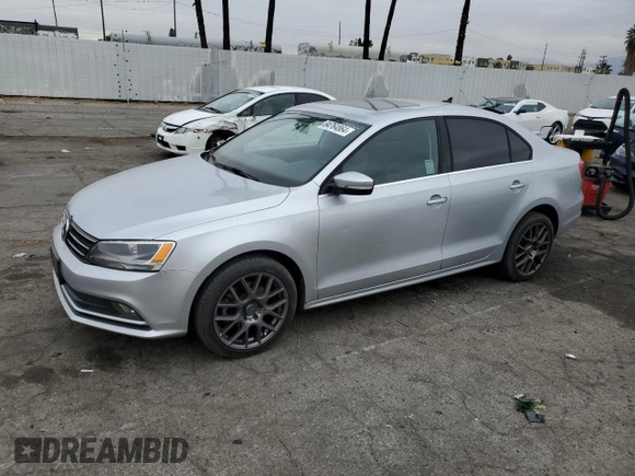2015 Volkswagen Jetta SE with VIN 3VWD17AJ5FM260475, listed as a Copart auction lot 84764864 with 119,189 mi miles and Salvage title. Bid and sale history available at DreamBid. Image 1.