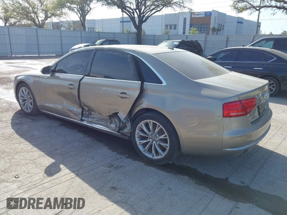 2012 Audi A8 z VIN WAURVAFD3CN024063, wystawiony jako IAAI lot #41706508 z przebiegiem Nie podano mil oraz . Historia ofert i sprzedaży dostępna na DreamBid. Obrazek 3.