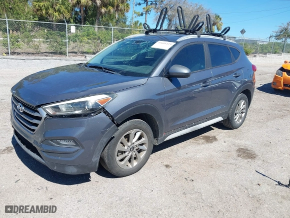 2017 Hyundai Tucson SE Plus with VIN KM8J33A45HU452928, listed as a IAAI auction lot 41601229 with 114,949 mi miles. Bid and sale history available at carsss.com. Image 17.