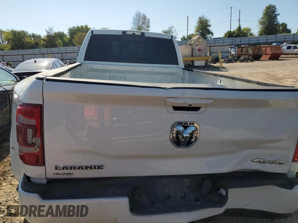 2019 Ram 3500 Laramie with VIN 3C63RRJL7KG676287, listed as a Copart auction lot 74248214 with 104,560 mi miles and Salvage Title. Bid and sale history available at carsss.com. Image 6.