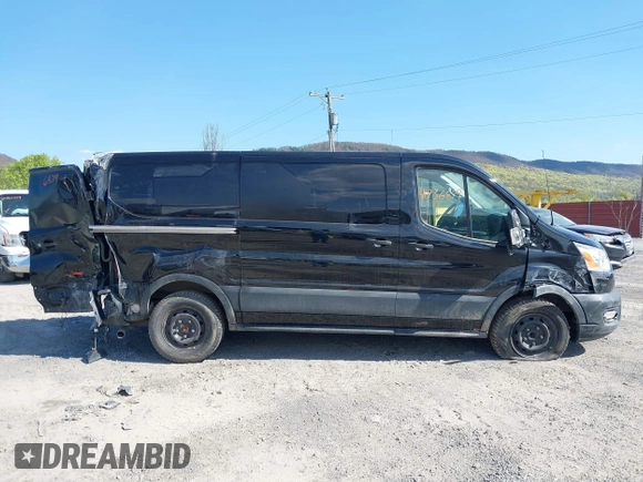 2021 Ford Transit Cargo with VIN 1FTYE1Y85MKA34465, listed as a IAAI auction lot 41736879 with 77,215 mi miles. Bid and sale history available at carsss.com. Image 13.