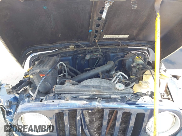 2000 Jeep Wrangler Sport with VIN 1J4FA49S5YP750123, listed as a IAAI auction lot 42060009 with Not Provided miles. Bid and sale history available at carsss.com. Image 10.