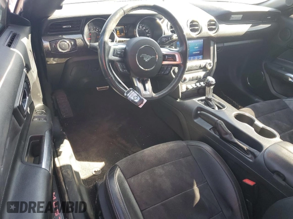 2021 Ford Mustang EcoBoost with VIN 1FA6P8TH9M5107634, listed as a Copart auction lot 57331415 with 79,159 mi miles and Salvage title. Bid and sale history available at DreamBid. Image 8.