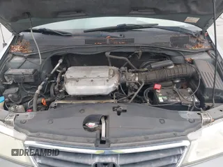 2002 Honda Odyssey EX-L z VIN 2HKRL18922H542116, wystawiony jako IAAI lot #42130335 z przebiegiem 205 053 mil mil oraz . Historia ofert i sprzedaży dostępna na DreamBid. Obrazek 10.