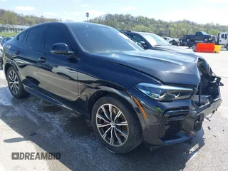 2022 BMW X6 xDrive40i z VIN 5UXCY6C0XN9K08571, wystawiony jako IAAI lot #41962962 z przebiegiem 62 797 mil mil oraz . Historia ofert i sprzedaży dostępna na DreamBid. Obrazek 1.