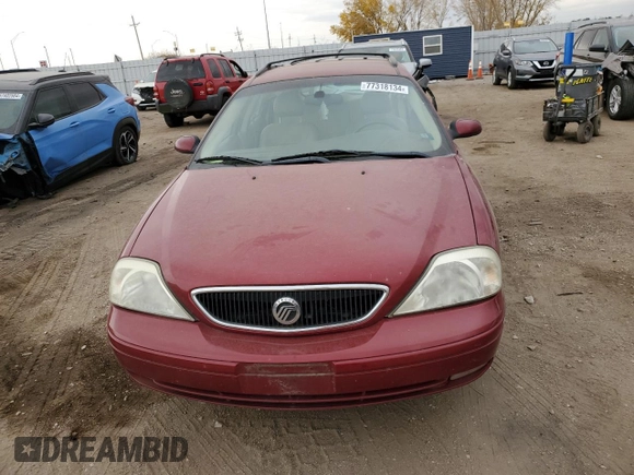 2002 Mercury Sable LS Premium z VIN 1MEFM59S52A640037, wystawiony jako Copart lot #77318134 z przebiegiem 137 836 mil mil oraz Szkody całkowita. Historia ofert i sprzedaży dostępna na DreamBid. Obrazek 5.
