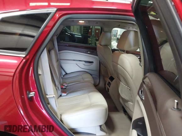 2016 Cadillac SRX Performance Collection z VIN 3GYFNCE32GS571230, wystawiony jako IAAI lot #42417263 z przebiegiem 59 634 mil mil oraz . Historia ofert i sprzedaży dostępna na DreamBid. Obrazek 8.
