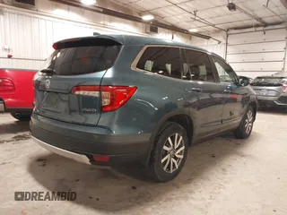 2019 Honda Pilot EX-L with VIN 5FNYF6H5XKB094879, listed as a IAAI auction lot 41265415 with 58,700 mi miles and . Bid and sale history available at DreamBid. Image 4.