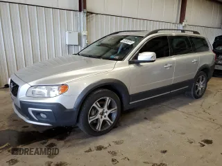 2014 Volvo XC70 T6 with VIN YV4902BZ1E1184510, listed as a Copart auction lot 66860874 with 130,942 mi miles and Salvage Title. Bid and sale history available at DreamBid. Image 1.