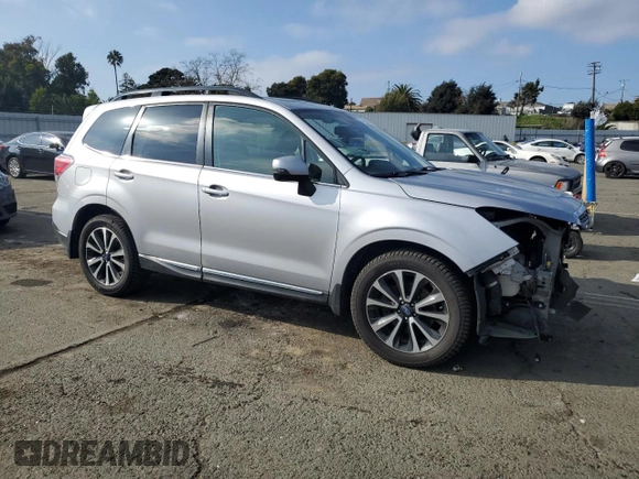 2017 Subaru Forester Touring with VIN JF2SJGWC2HH539654, listed as a Copart auction lot 88998765 with 89,654 mi miles and Salvage Title. Bid and sale history available at carsss.com. Image 4.