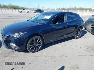 2014 Mazda 3 S Grand Touring with VIN JM1BM1M32E1208762, listed as a IAAI auction lot 41814130 with 117,620 mi miles and . Bid and sale history available at DreamBid. Image 18.