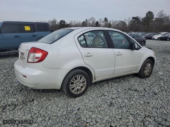2013 Suzuki SX4 LE with VIN JS2YC5A37D6101979, listed as a Copart auction lot 42185855 with 118,855 mi miles and Salvage Title. Bid and sale history available at carsss.com. Image 3.
