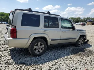 2007 Jeep Commander Sport z VIN 1J8HG48K67C651209, wystawiony jako Copart lot #64049035 z przebiegiem 216 628 mil mil oraz Szkoda całkowita • Salvage title. Historia ofert i sprzedaży dostępna na DreamBid. Obrazek 3.
