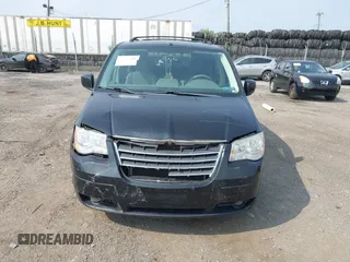 2008 Chrysler Town & Country Touring z VIN 2A8HR54P48R765302, wystawiony jako IAAI lot #42487816 z przebiegiem 128 761 mil mil oraz . Historia ofert i sprzedaży dostępna na DreamBid. Obrazek 6.