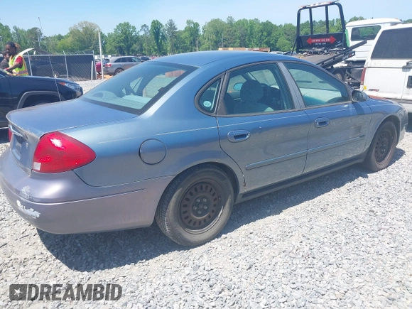 2000 Ford Taurus SE with VIN 1FAFP53U1YG213906, listed as a IAAI auction lot 42064922 with 117,043 mi miles and . Bid and sale history available at DreamBid. Image 4.