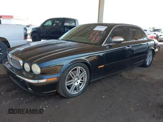2005 Jaguar XJ Vanden Plas z VIN SAJWA82C05SG47589, wystawiony jako IAAI lot #42409697 z przebiegiem 222 598 mil mil oraz . Historia ofert i sprzedaży dostępna na DreamBid. Obrazek 17.