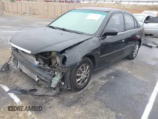 2001 Honda Civic DX with VIN 2HGES15221H525334, listed as a IAAI auction lot 41559664 with 309,641 mi miles. Bid and sale history available at carsss.com. Image 18.