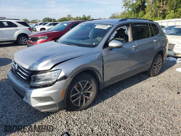 2021 Volkswagen Tiguan S with VIN 3VV1B7AX9MM023655, listed as a Copart auction lot 64159445 with 55,795 mi miles and Salvage title. Bid and sale history available at DreamBid. Image 1.