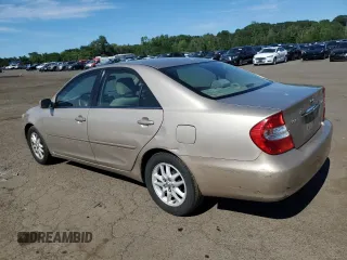 2004 Toyota Camry LE with VIN 4T1BE32K84U929163, listed as a Copart auction lot 65193485 with 245,734 mi miles and Clean title. Bid and sale history available at DreamBid. Image 2.