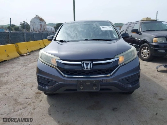 2015 Honda CR-V LX with VIN 3CZRM3H32FG702573, listed as a IAAI auction lot 41824116 with 266,847 mi miles. Bid and sale history available at carsss.com. Image 12.