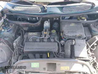 2006 MINI Convertible with VIN WMWRF33566TG15710, listed as a IAAI auction lot 41636955 with Not Provided miles and . Bid and sale history available at DreamBid. Image 10.