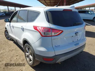 2015 Ford Escape SE with VIN 1FMCU0G7XFUA52818, listed as a IAAI auction lot 41679303 with 127,098 mi miles. Bid and sale history available at carsss.com. Image 3.
