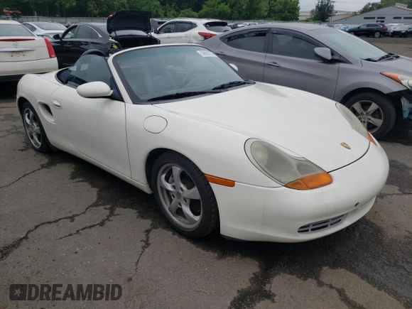 2001 Porsche Boxster z VIN WP0CA29821U622592, wystawiony jako Copart lot #56050735 z przebiegiem Nie podano mil oraz Szkoda całkowita • Salvage title. Historia ofert i sprzedaży dostępna na DreamBid. Obrazek 4.
