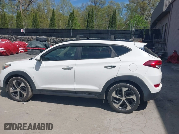 2016 Hyundai Tucson Eco with VIN KM8J3CA22GU076489, listed as a IAAI auction lot 42169732 with 153,597 mi miles. Bid and sale history available at carsss.com. Image 14.