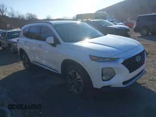 2019 Hyundai Santa Fe Ultimate with VIN 5NMS5CAA9KH012167, listed as a IAAI auction lot 41614279 with 100,925 mi miles and . Bid and sale history available at DreamBid. Image 1.