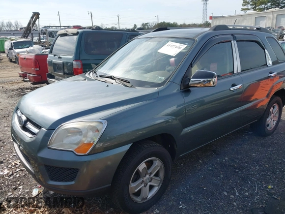 2009 Kia Sportage LX with VIN KNDJE723197563651, listed as a IAAI auction lot 41477610 with 168,797 mi miles and . Bid and sale history available at carsss.com. Image 2.