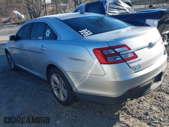2015 Ford Taurus SEL with VIN 1FAHP2E84FG189640, listed as a IAAI auction lot 41814795 with 100,209 mi miles and . Bid and sale history available at DreamBid. Image 3.