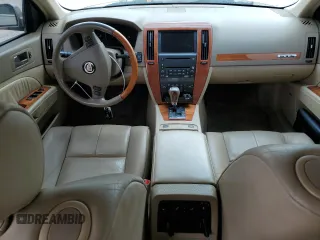 2006 Cadillac STS with VIN 1G6DC67A660194412, listed as a Copart auction lot 69878774 with 140,675 mi miles and Salvage Title. Bid and sale history available at DreamBid. Image 8.