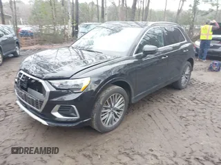 2021 Audi Q3 Premium with VIN WA1AUCF34M1148531, listed as a IAAI auction lot 41815286 with 31,934 mi miles and . Bid and sale history available at DreamBid. Image 17.