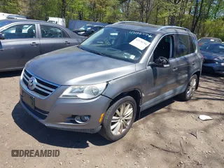 2011 Volkswagen Tiguan SE with VIN WVGBV7AX8BW514320, listed as a IAAI auction lot 42138794 with 76,079 mi miles and . Bid and sale history available at DreamBid. Image 2.