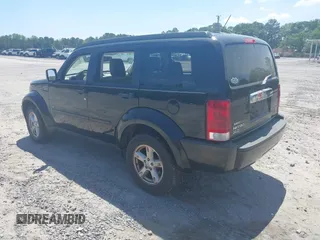 2007 Dodge Nitro SLT with VIN 1D8GU58K37W682094, listed as a IAAI auction lot 42155006 with 115,748 mi miles. Bid and sale history available at carsss.com. Image 3.