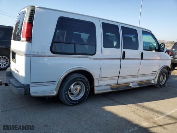1999 Chevrolet Express Van with VIN 1GBFG15R6X1094977, listed as a Copart auction lot 48469965 with 0 mi miles and Salvage Title. Bid and sale history available at carsss.com. Image 3.
