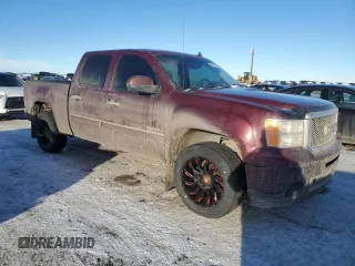 2013 GMC Sierra 1500 Denali z VIN 3GTP2XE27DG293506, wystawiony jako Copart lot #84682194 z przebiegiem 312 025 mil mil oraz Czysty tytuł • Clean title. Historia ofert i sprzedaży dostępna na DreamBid. Obrazek 4.