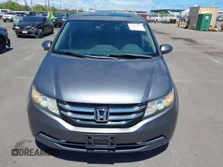 2014 Honda Odyssey EX-L with VIN 5FNRL5H69EB018557, listed as a IAAI auction lot 42855051 with 165,081 mi miles and . Bid and sale history available at DreamBid. Image 6.