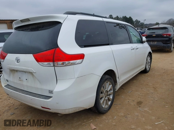 2011 Toyota Sienna XLE with VIN 5TDDK3DC0BS015244, listed as a IAAI auction lot 41413002 with 128,591 mi miles. Bid and sale history available at carsss.com. Image 4.