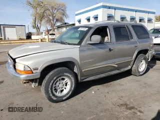1999 Dodge Durango z VIN 1B4HS28Z4XF570938, wystawiony jako Copart lot #50974455 z przebiegiem Nie podano mil oraz Czysty tytuł • Clean title. Historia ofert i sprzedaży dostępna na DreamBid. Obrazek 1.