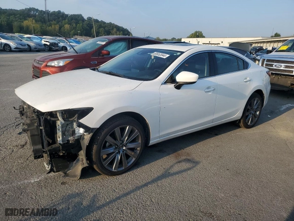 2021 Mazda Mazda6 Touring with VIN JM1GL1VM1M1612246, listed as a Copart auction lot 69552044 with 47,933 mi miles and Salvage Title. Bid and sale history available at carsss.com. Image 1.