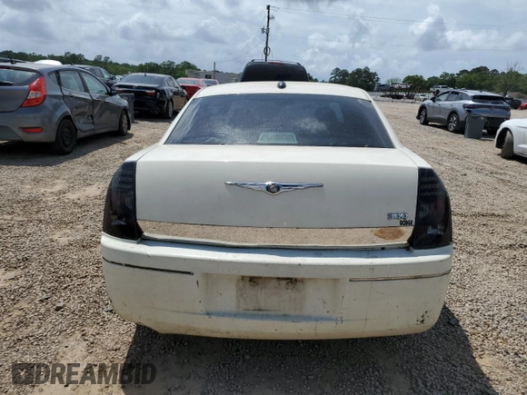 2005 Chrysler 300 300 z VIN 2C3JA43RX5H664428, wystawiony jako Copart lot #53851555 z przebiegiem Nie podano mil oraz Szkoda całkowita • Salvage title. Historia ofert i sprzedaży dostępna na DreamBid. Obrazek 6.