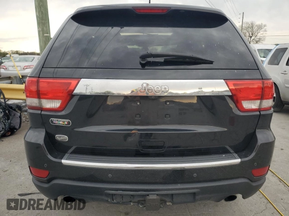2012 Jeep Grand Cherokee Overland with VIN 1C4RJECT7CC311578, listed as a Copart auction lot 51905715 with 172,980 mi miles and Salvage Title. Bid and sale history available at carsss.com. Image 6.