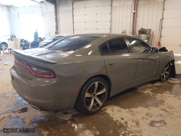 2017 Dodge Charger SE with VIN 2C3CDXBG0HH546619, listed as a IAAI auction lot 41617484 with 105,574 mi miles. Bid and sale history available at carsss.com. Image 4.