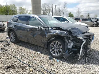 2021 Mazda CX-9 Grand Touring with VIN JM3TCBDY7M0508897, listed as a Copart auction lot 55645515 with 62,917 mi miles and Salvage title. Bid and sale history available at DreamBid. Image 4.