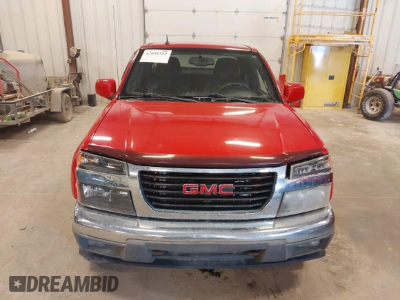 2011 GMC Canyon z VIN 1GTJ6NFE1B8109333, wystawiony jako IAAI lot #42035352 z przebiegiem 135 403 mil mil oraz . Historia ofert i sprzedaży dostępna na DreamBid. Obrazek 6.