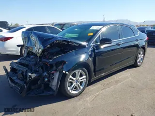 2016 Ford Fusion Energi Titanium with VIN 3FA6P0SU8GR229936, listed as a IAAI auction lot 41506152 with 93,105 mi miles. Bid and sale history available at carsss.com. Image 2.