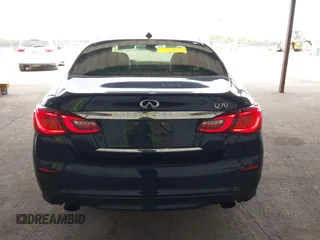 2015 Infiniti Q70 z VIN JN1BY1AP9FM542429, wystawiony jako IAAI lot #41903214 z przebiegiem 139 255 mil mil oraz . Historia ofert i sprzedaży dostępna na DreamBid. Obrazek 16.