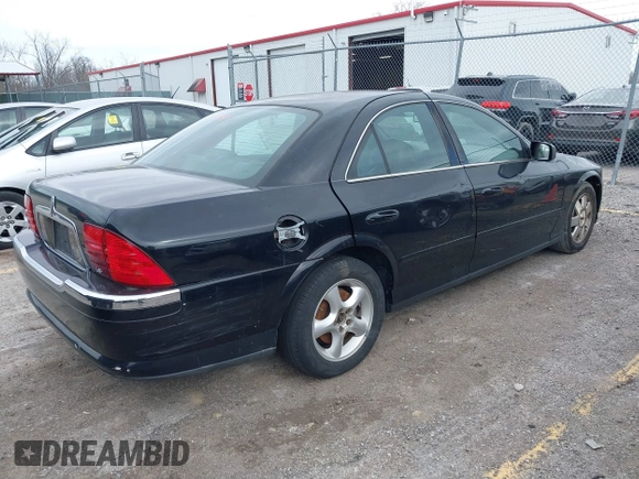 2002 Lincoln LS w/Base Pkg with VIN 1LNHM86S82Y701044, listed as a IAAI auction lot 41592614 with 192,902 mi miles. Bid and sale history available at carsss.com. Image 4.